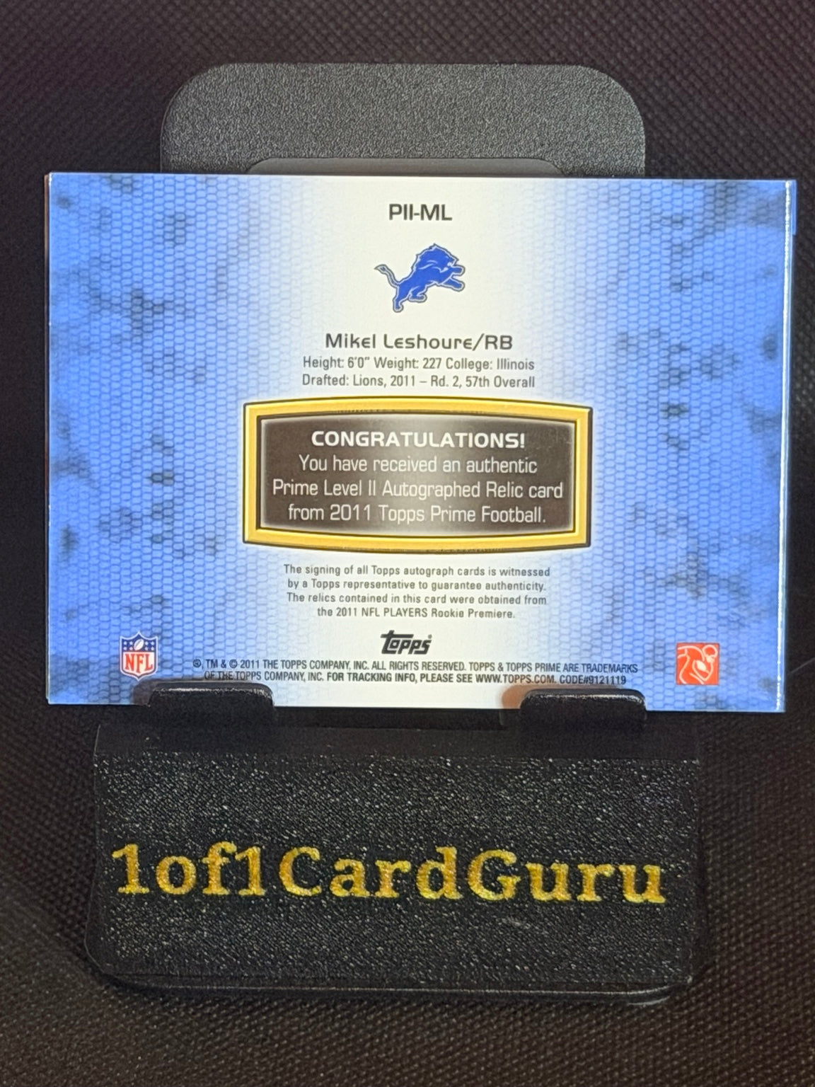 2011 Topps Prime Mikel Leshoure Level II Autographed Relic Booklet #PII-ML 03/15 back