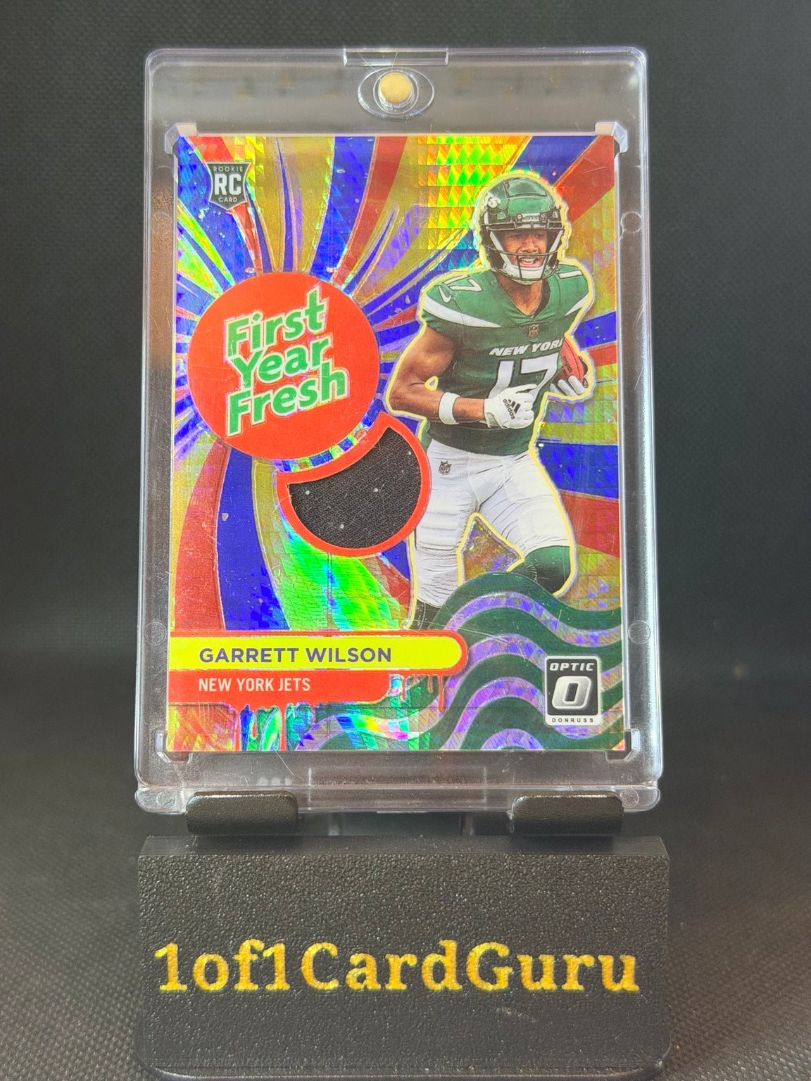 2022 Donruss Optic Garrett Wilson First Year Fresh Prizm Rookie Relic #FYF-GW front