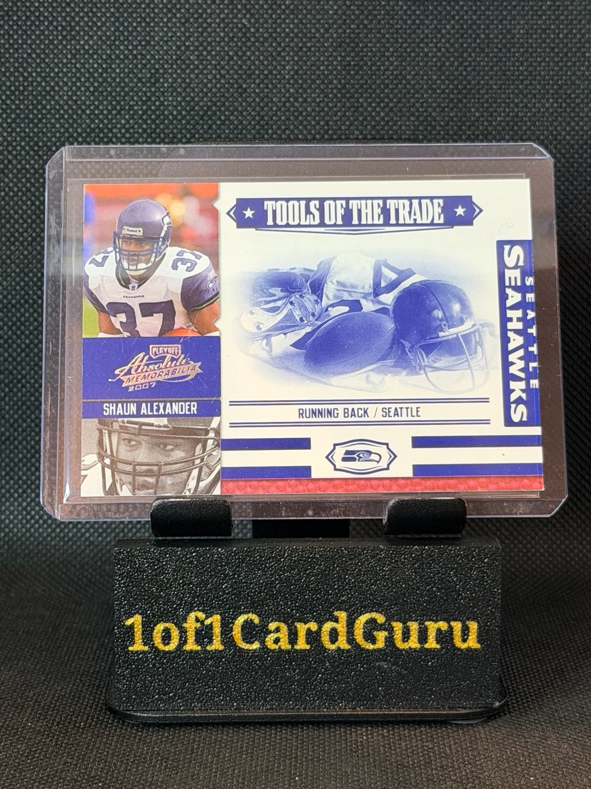 2007 Playoff Absolute Tools of the Trade Shaun Alexander #TOT-129 Blue 29/75 — front