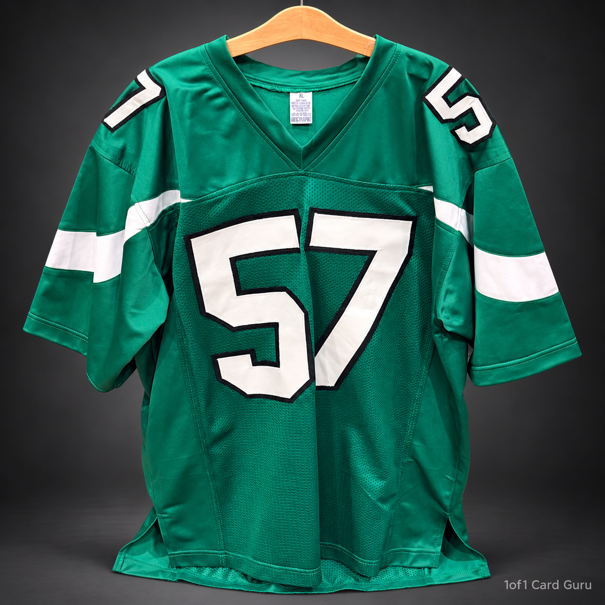 Studio-background front view of C.J. Mosley custom green number 57 jersey, XL
